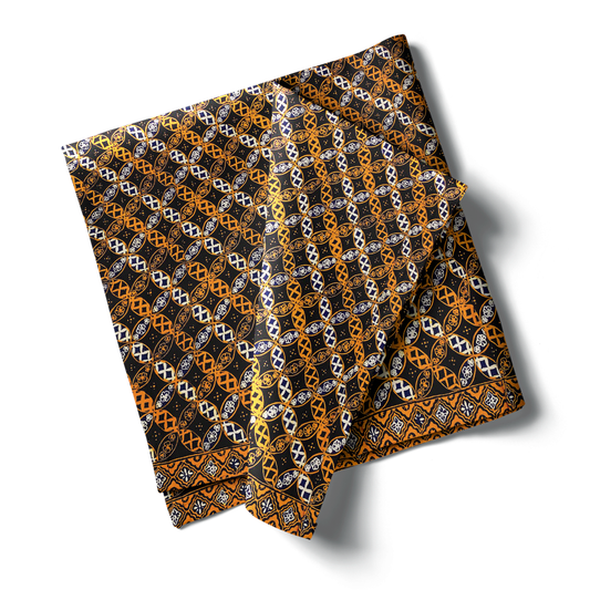 Kain batik Paris Cap Bledak berwarna cokelat tua dengan motif bunga berwarna emas. Kain dilipat rapi, menampilkan detail pola yang rumit. Tampilan produk diambil dari postingan benangraja.kain.